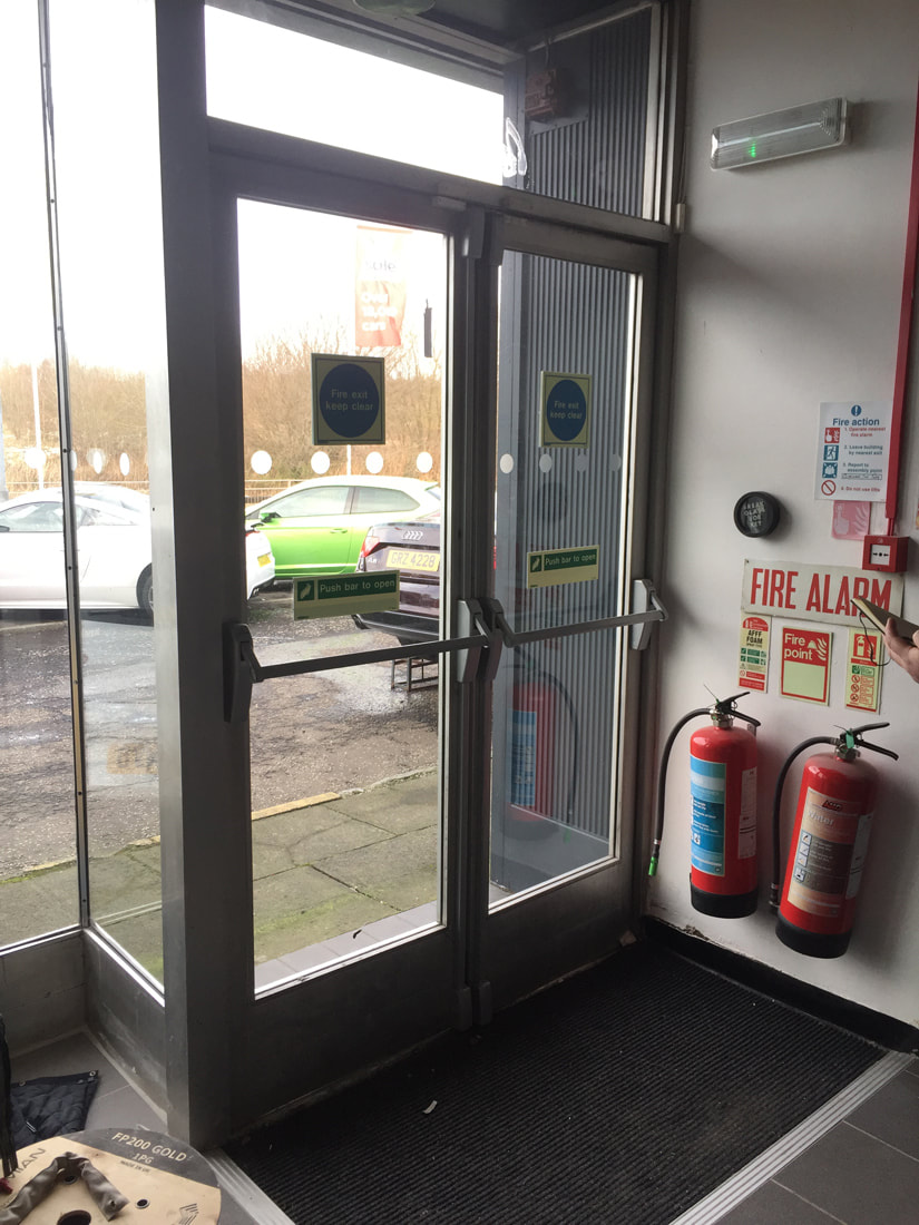 Replacing toughened glass panel on a shopfront door in Finchley - N3
