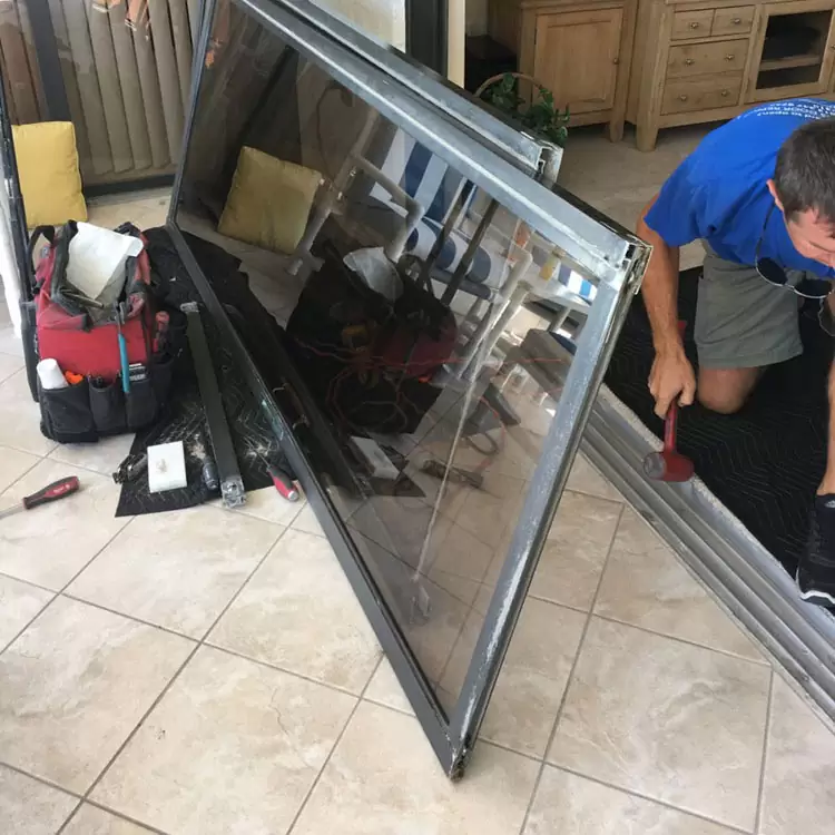 Shopfront glass door repair with laminated safety glazing